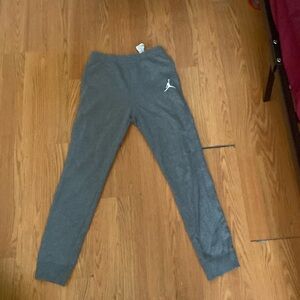 Grey Jordan sweatpants.